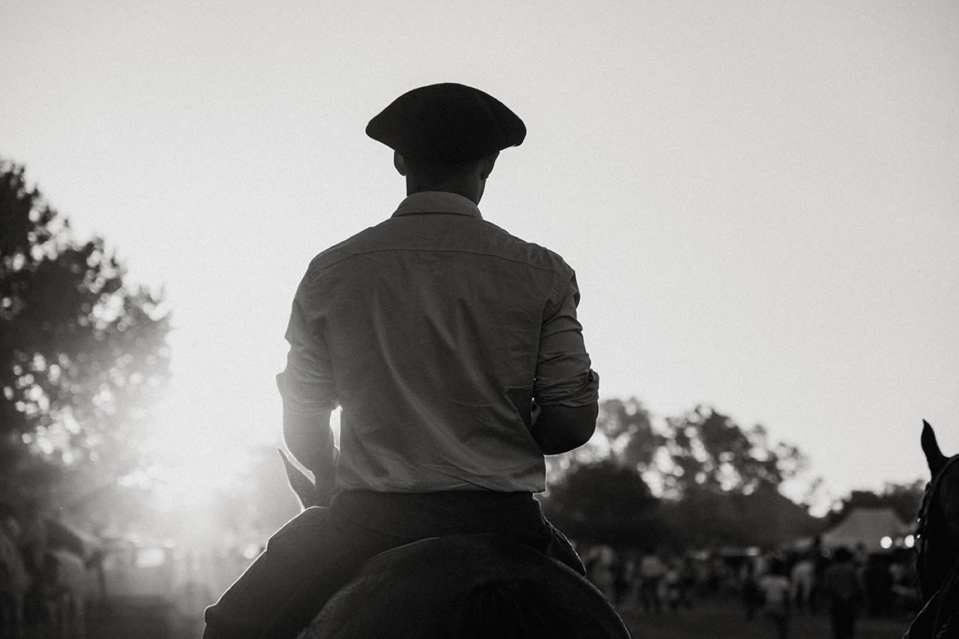 Gaucho seen from behind in morning light